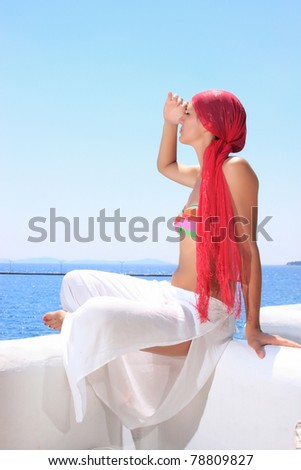 Beautiful woman enjoying the beach in Greece