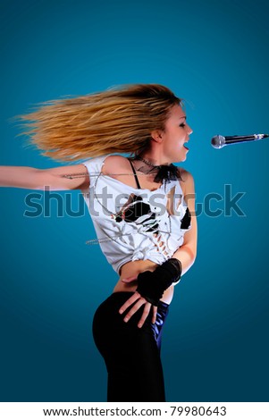Portrait of female rock singer with microphone - including clipping path easy to remove the background