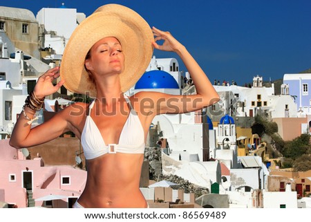 Young woman enjoying Santorini island Greece