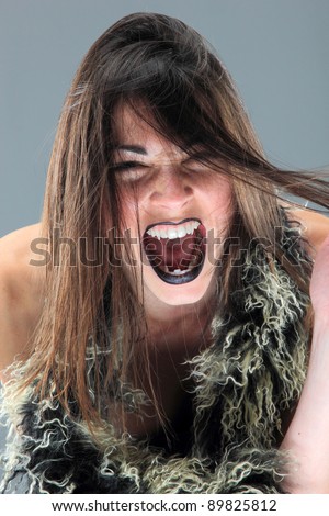 Beauty young woman screaming portrait