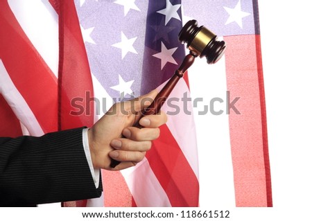 american court, gavel in front of an american flag