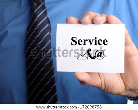 businessman showing his business card with the message service on it