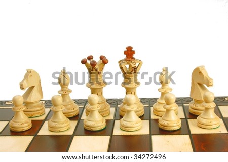 chess pieces on board - white backgound - symbol of strategy