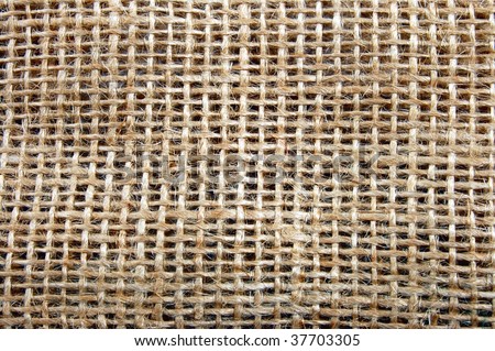 textured background of a coffee sack canvas.