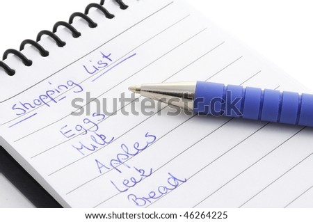Pen on the handwriting shopping list. isolated on white background.