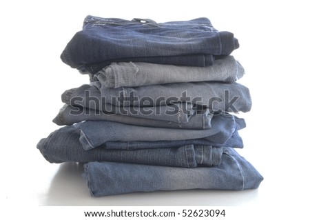 stock-photo-stack-of-blue-jeans-isolated-on-white-background-52623094.jpg