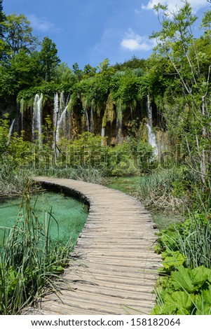 Waterfall and Wooden Path in Plitvice National Park in Croatia