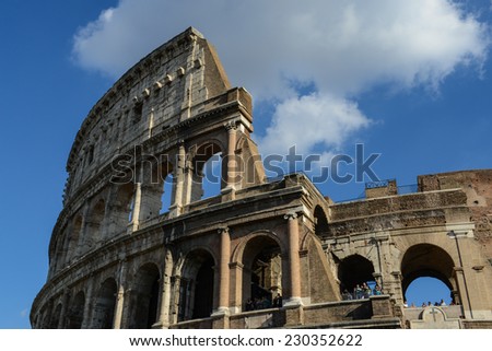 ROME - OCTOBER 18: Colosseum exterior on October 18, 2014 in Rome, Italy. The Colosseum is one of Rome's most popular tourist attractions with over 5 million visitors per year.