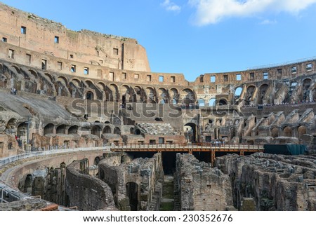 ROME - OCTOBER 18: Coliseum interior on October 18, 2014 in Rome, Italy. The Coliseum is one of Rome\'s most popular tourist attractions with over 5 million visitors per year.