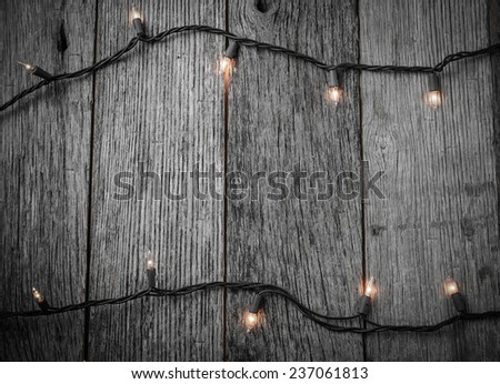 White Christmas Tree Lights with Rustic Wood Background