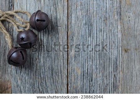 Rustic Christmas Bells and Wood Background
