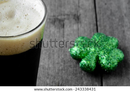 Pint of Stout Beer with Green Shamrock