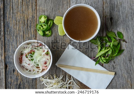 Pho Fast Food To Go on Wood Background