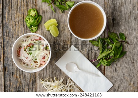 Pho Fast Food To Go on Wood Background
