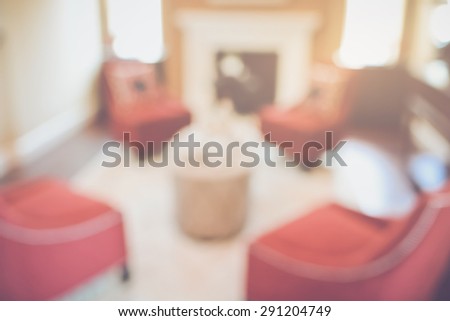 Blurred Living Room with Red Chairs applying Retro Instagram Style Filter