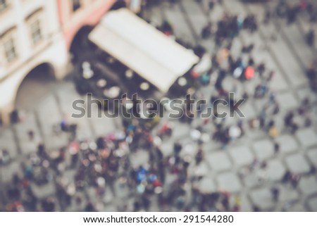 Blurred Crowd of People in a Plaza