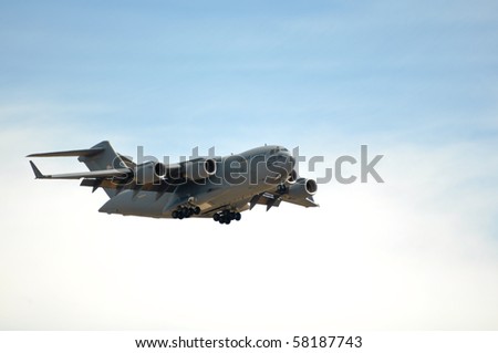 SACRAMENTO, CA - SEPTEMBER 13:C-17s in flight at the California Capital Airshow, September 13, 2009, at the Mather AFB in Sacramento CA.  The pilot is showing his technical skills to general public.