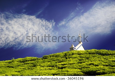 Church in the clouds in the tea gardens of Munnar, India.