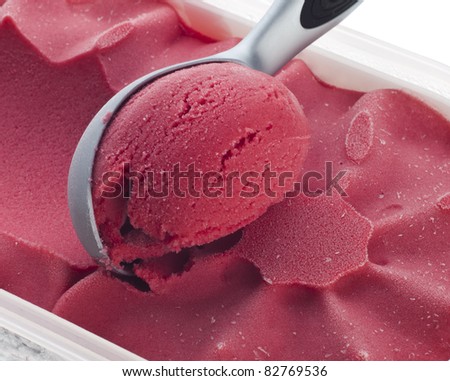 Taking raspberry ice cream from the box