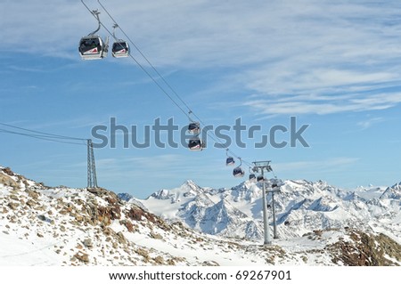 Winter Holiday Gondola Ski Lift Above Austrian Alps. Solden.