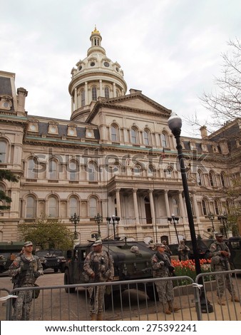 BALTIMORE, MD - MAY 1, 2015: The National Guard surrounds the City Hall  building in Baltimore, MD, on May 1, 2015, during a week of citizen protests and riots against police brutality.