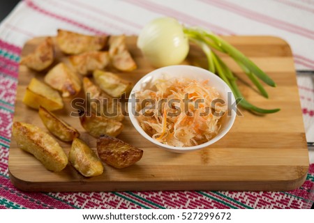 potato in a rural way, potato house, French fries, vegetable, potato the baked in an oven, Belarusian cuisine, the ethnic cuisine, Russian and Ukrainian ethnic cuisine, sauerkraut, onions