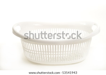 empty white plastic laundry basket on white