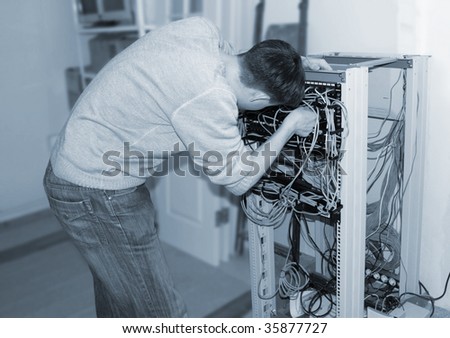 IT Technician With Server Cables
