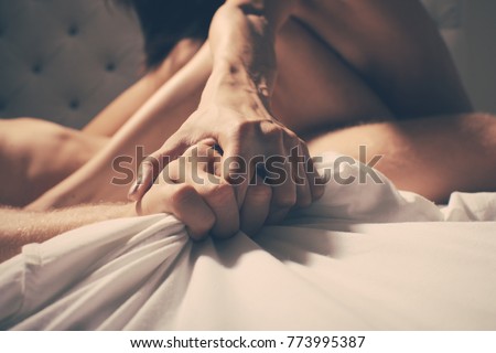 Passionate couple kissing, boy and girl. Having sex. Young lovers. People in love. Positions kamasutra. Erotic moments. Concept photo. Secret. Fashion. Hot babe. Party. Night background. Sensual. Sex.