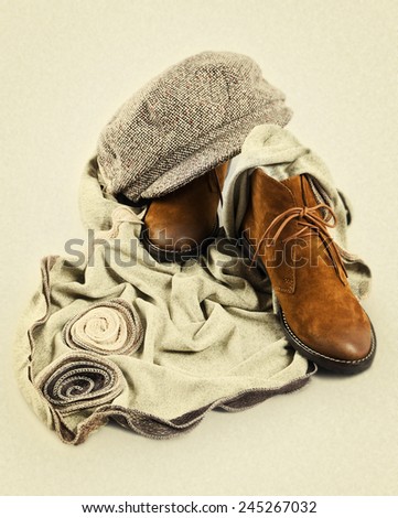 brown women\'s shoes with a cap and a scarf on a white background. Picture in retro style
