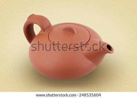 Ceramic teapot for brewing tea on white background. picture in retro style