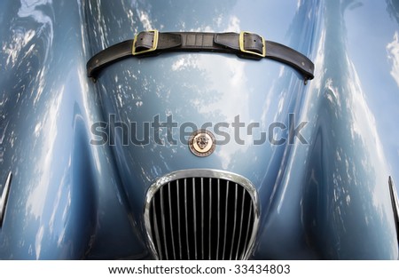 MISSISSAUGA, ONTARIO - JULY 22: The front view of a vintage blue Jaguar Roadster is shown at a car show on July 22, 2007 in Mississauga, Ontario.