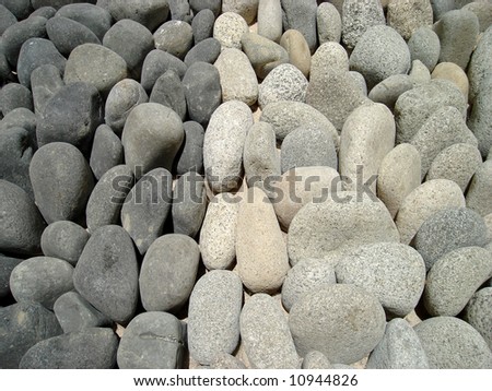 Light and dark stones placed in a courtyard