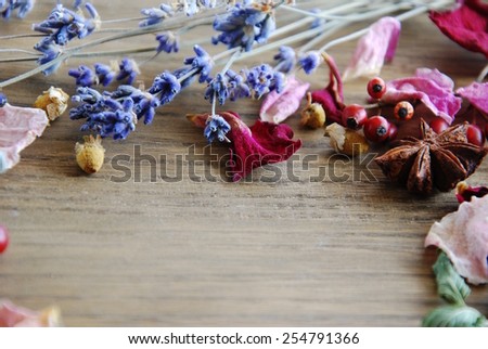 dried herbs on wooden board