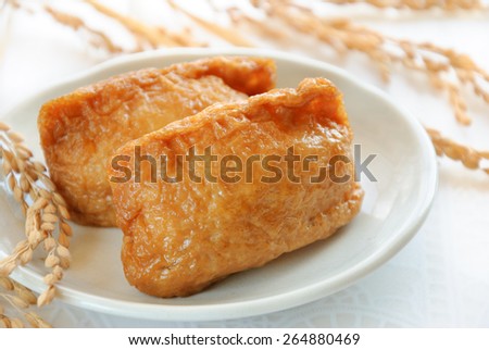 Japanese sushi called Inari-sushi, fried bean-curd stuffed with boiled rice