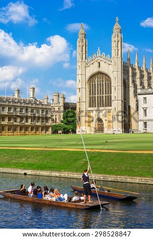 Punt trip (sightseeing with boat) along River Cam near Kings College in the city of Cambridge, England.