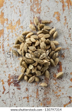 Cardamom is the seed pods of a perennial which is native to India. The plant, related to ginger, produces green seed pods with small dark seeds inside.
