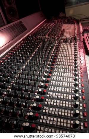 Mixing desk in recording studio.