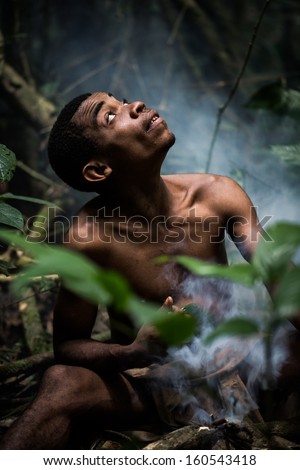 Dja Forest, Cameroon - Aug 5: Male Pygmy In The Forest, Forest Pygmies Could Lose Their Habitat Due To Logging Companies And Ivory Traffickers On Aug 5, 2013 In The Dja Forest, Cameroon