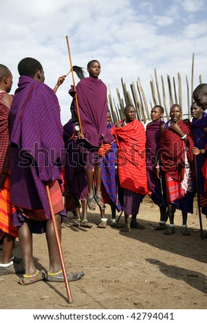 TANZANIA-AUGUST 18: Massai Warriors exhibits her dance before the visit of tourists, their main source of revenue today, August 18, 2007 in Ngorongoro, Tanzania.