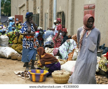 MALI - AUGUST 17: Women in the market of Djenne, Monday marks one of the largest markets in Mali near the great mosque, August 17, 2009 in Djenne, Mali