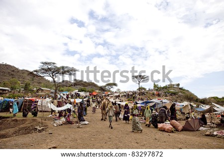 SEMBETE, ETHIOPIA - JULY 31: Sembete Market, a local market attended by a variety of ethnic groups such as Afar, Oromo and Amara, to sell camels, salt and jewelry. July 31, 2011 in Sembete, Ethiopia