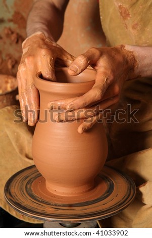 http://image.shutterstock.com/display_pic_with_logo/445000/445000,1258393554,3/stock-photo-hands-of-potter-do-a-clay-pot-41033902.jpg