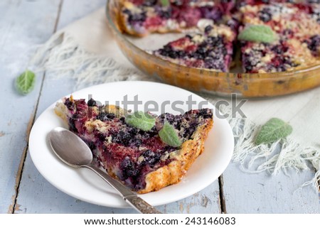 Berry pie with frozen strawberries, blueberries (made of  cream, eggs, sugar, flour)