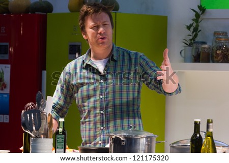 LONDON, UK - DEC 7: Jamie Oliver conducts a cooking demonstration at the Excel center in London, Friday, December 7, 2012 in London, UK