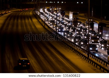 LONDON, UK - MAR 11: Freak snow fall in the UK causes traffic congestion  on the MAR 14, 2013 in London, UK
