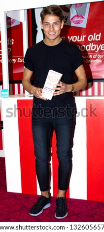LONDON, UK - NOV 11: Joey Essex gives away kisses in a London Store in London on the NOV 11, 2012 in London, UK
