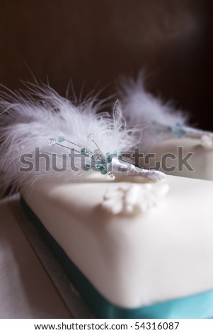 stock photo Wedding cake and feathers