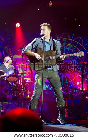 LONDON, UK - DECEMBER 9: Coldplay perform to a sell out crowd in the O2 arena, on the December 9, 2011 in London, UK