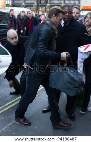 LONDON, UK - FEB 01: David Beckham arrives at a H&M store in Regent Street, London to promote his new clothing range on the February 01, 2012 in London, UK